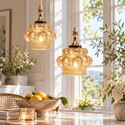 Pair of 1960s Swedish bubble glass pendant lights with brass-tone fittings