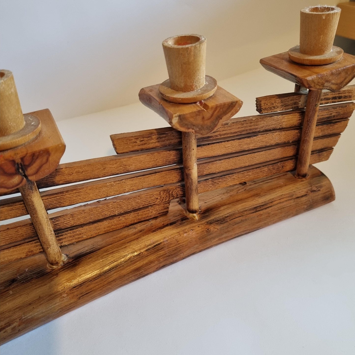 Handmade Wooden Candle Holder: Rustic Scandinavian Fence Design with three candle holders on natural wood base