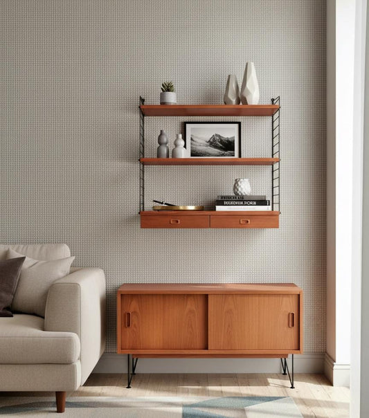 Danish Teak String Shelf with Drawers – 1960s Scandinavian Wall Unit displayed with modern decor above a wooden cabinet.
