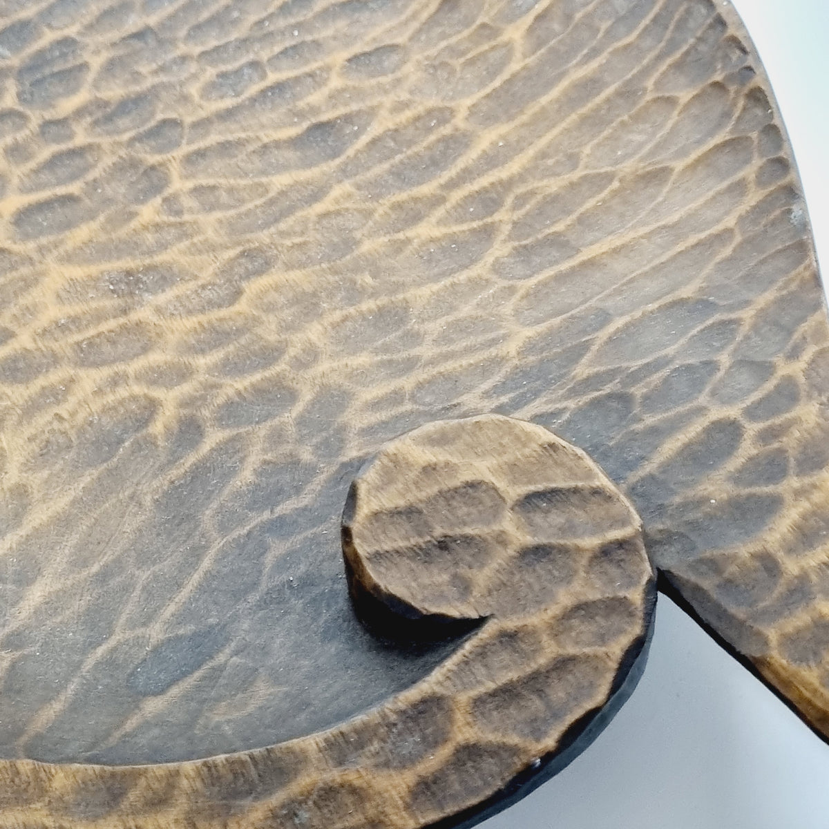 Rippling gouge carving detail on hand carved wooden tray