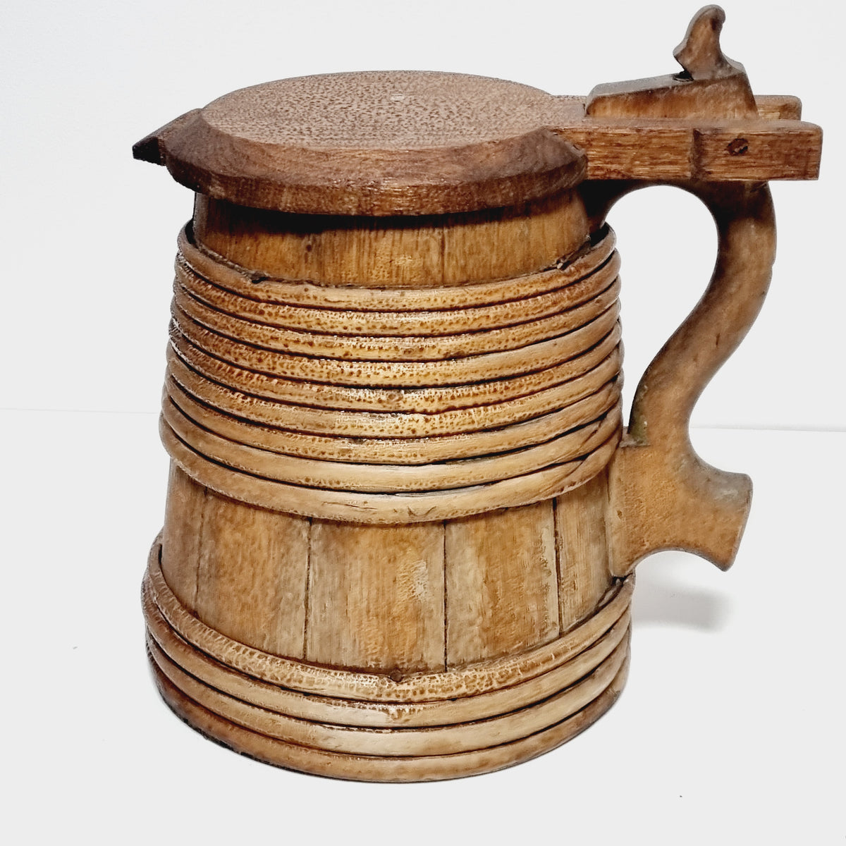 Antique Scandinavian wooden tankard, front view