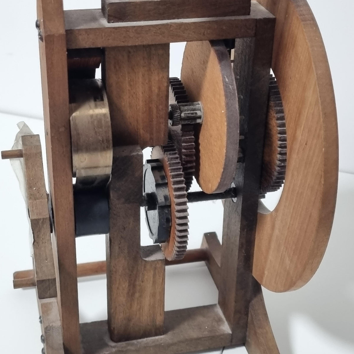 BUCO Swiss wooden gear table clock by Otto Baumann with exposed gears and foliot – photo 8