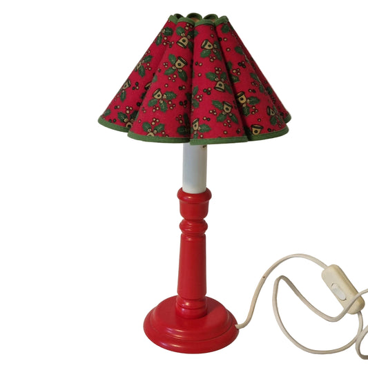 Swedish Christmas table lamp with red wooden base and holly bell shade