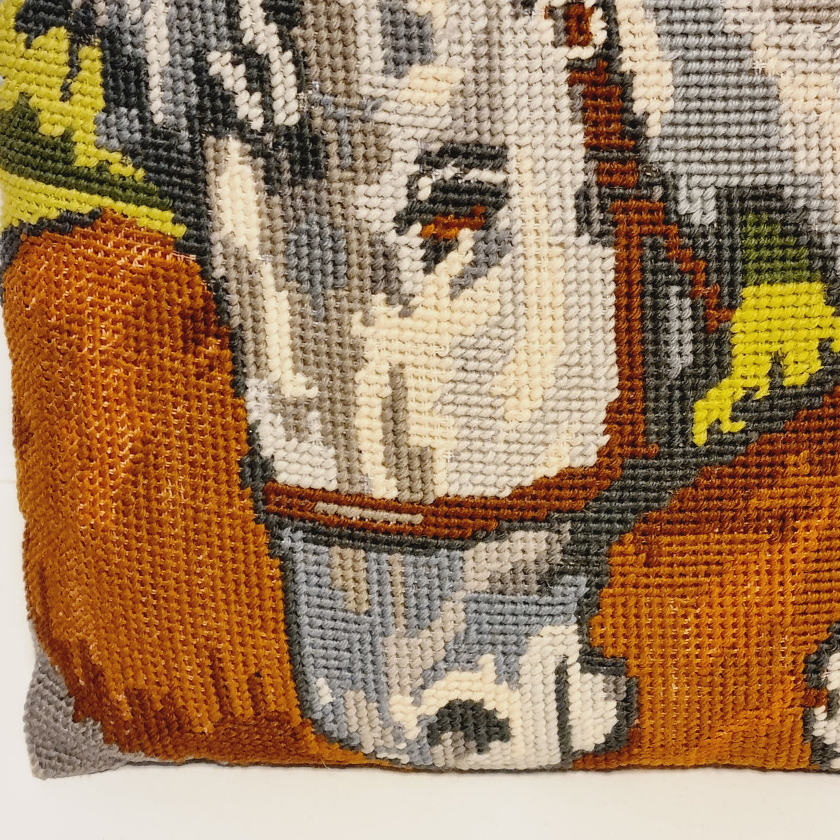 Close-up of the stitching in the horse needlepoint pillow