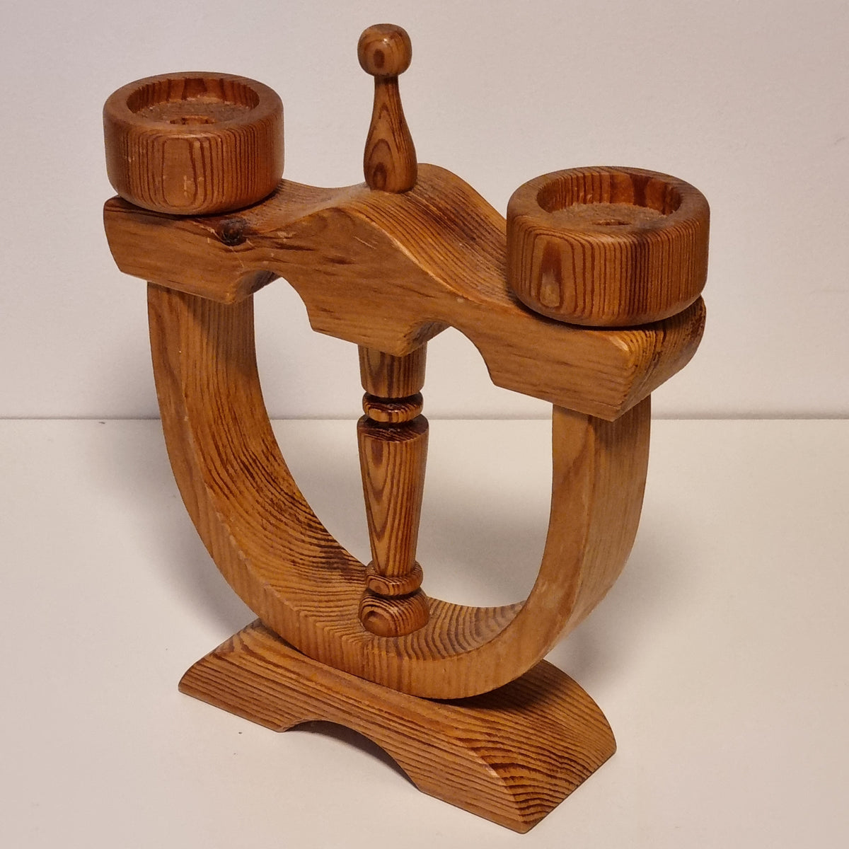 Solid pine grain detail on vintage Smålandsslöjd candle holder
