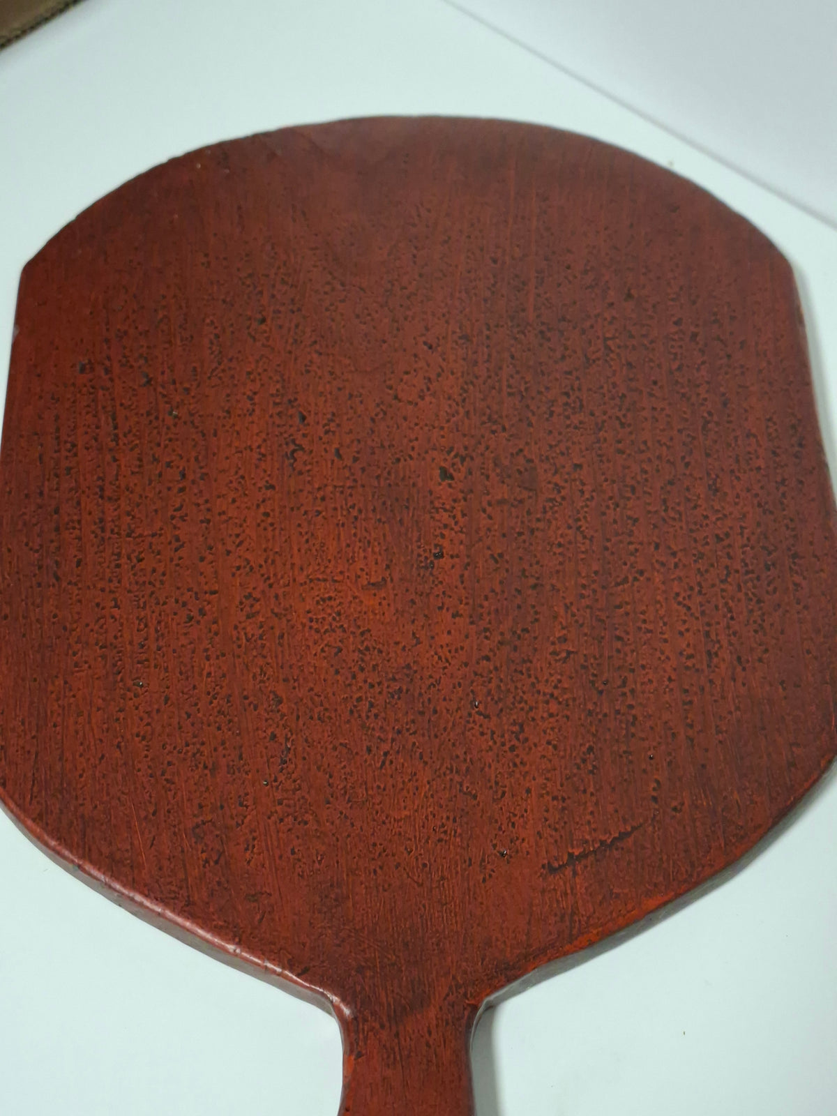 Plain Falu red back of the antique Swedish bread board