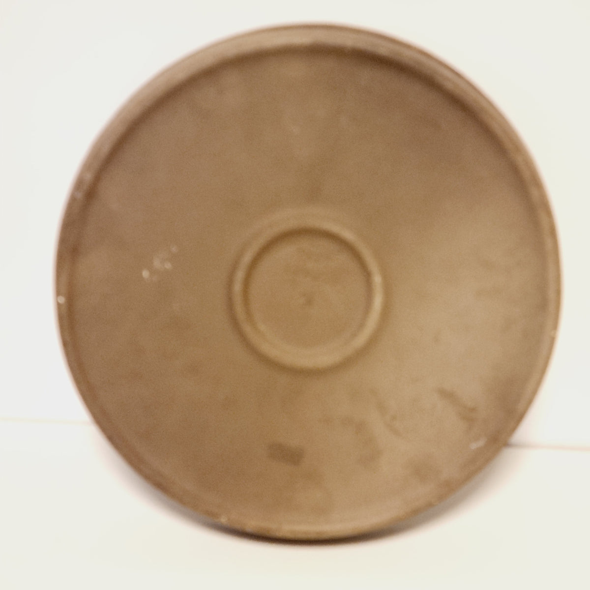 Back of the Upsala Ekeby wall plate with impressed UE Sweden 6043 mark