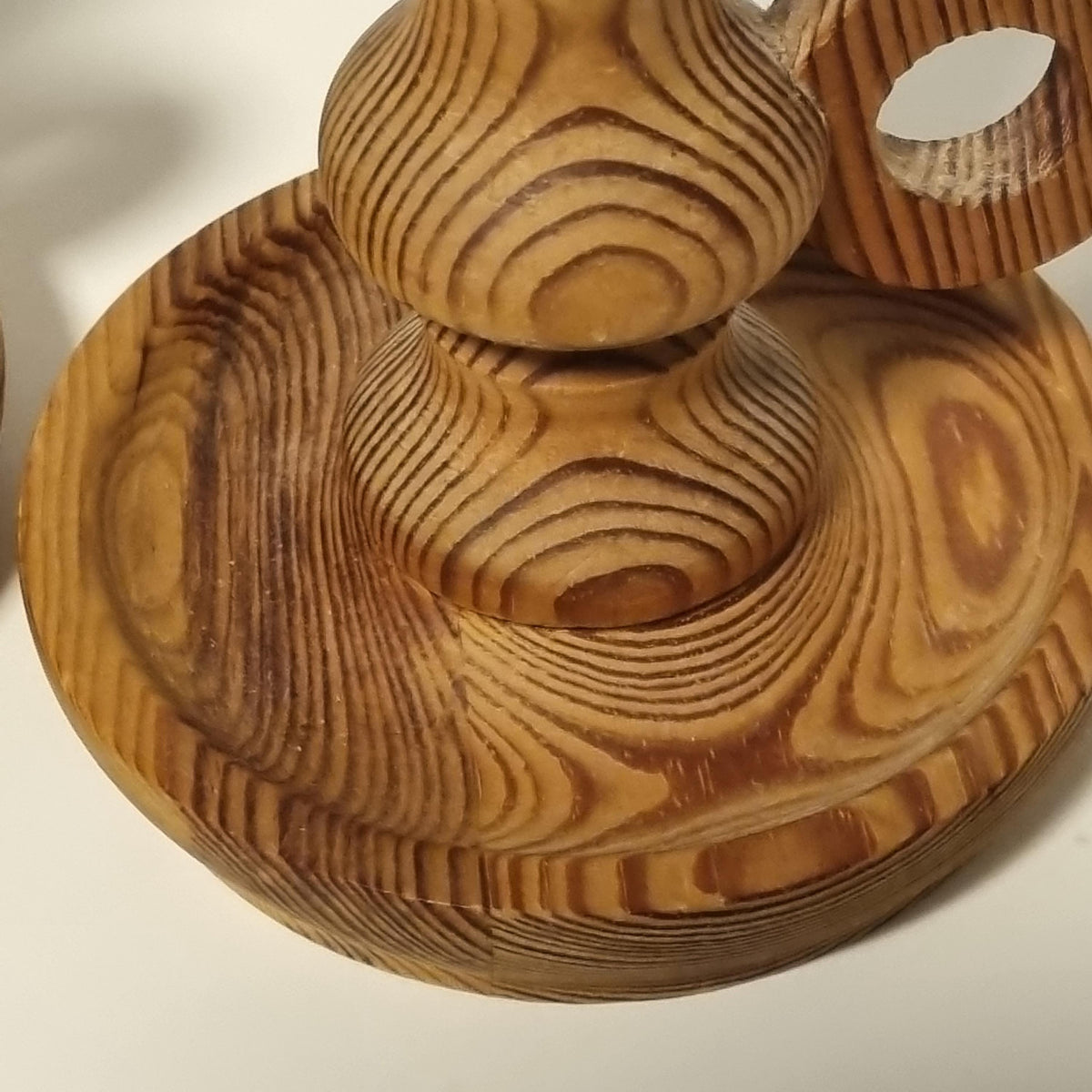 Pair of turned wooden candle holders with ring handles, honey-brown – photo 8