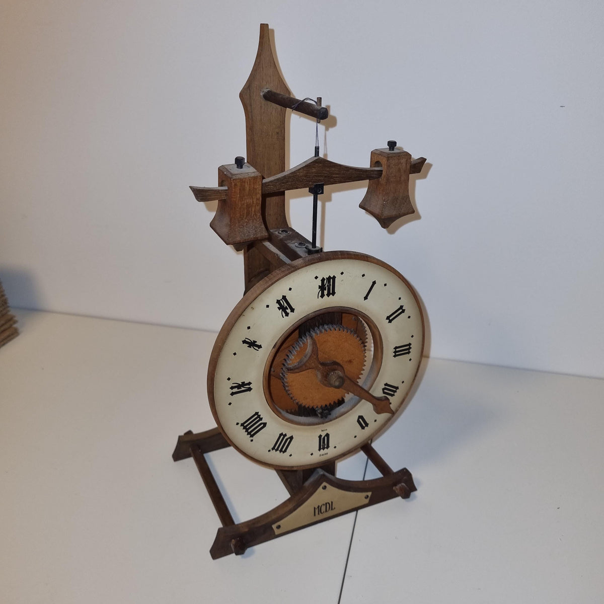 BUCO Swiss wooden gear table clock by Otto Baumann with exposed gears and foliot – photo 5