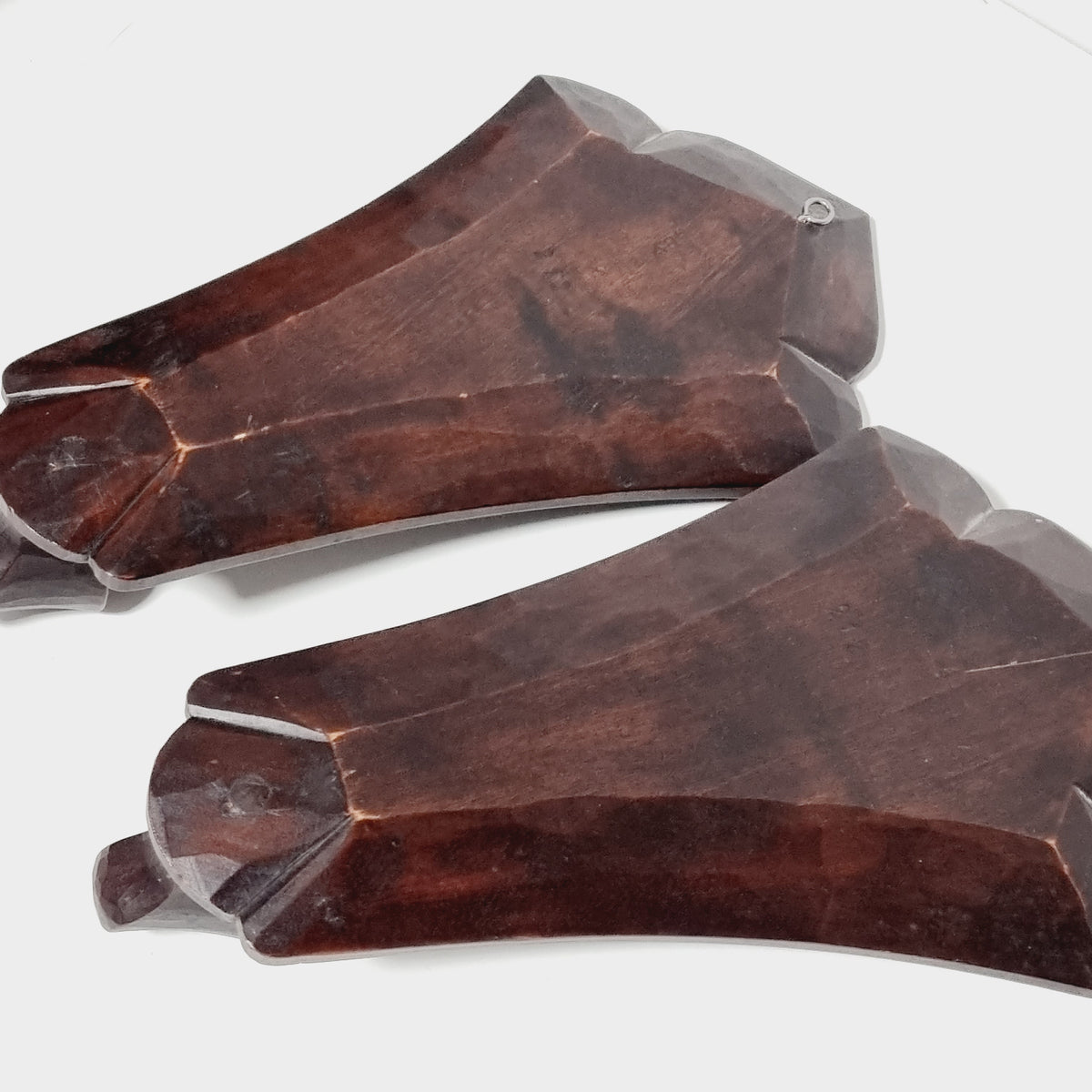 Steneby Hemslöjd carved wooden wall sconces side by side
