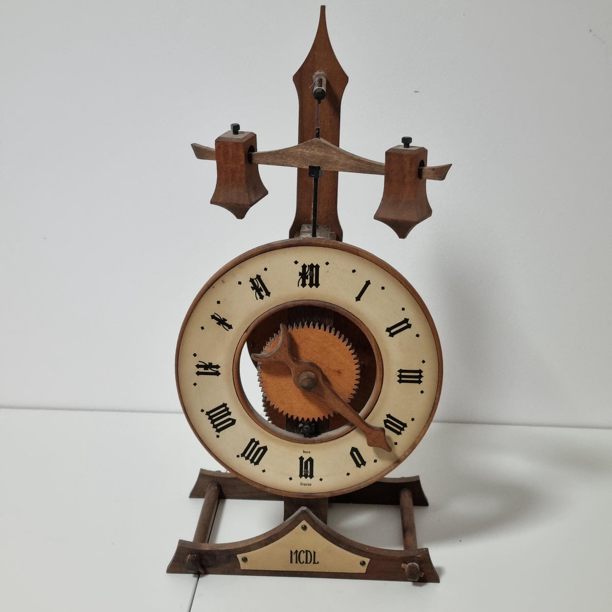 BUCO Swiss wooden gear table clock by Otto Baumann with exposed gears and foliot – photo 2
