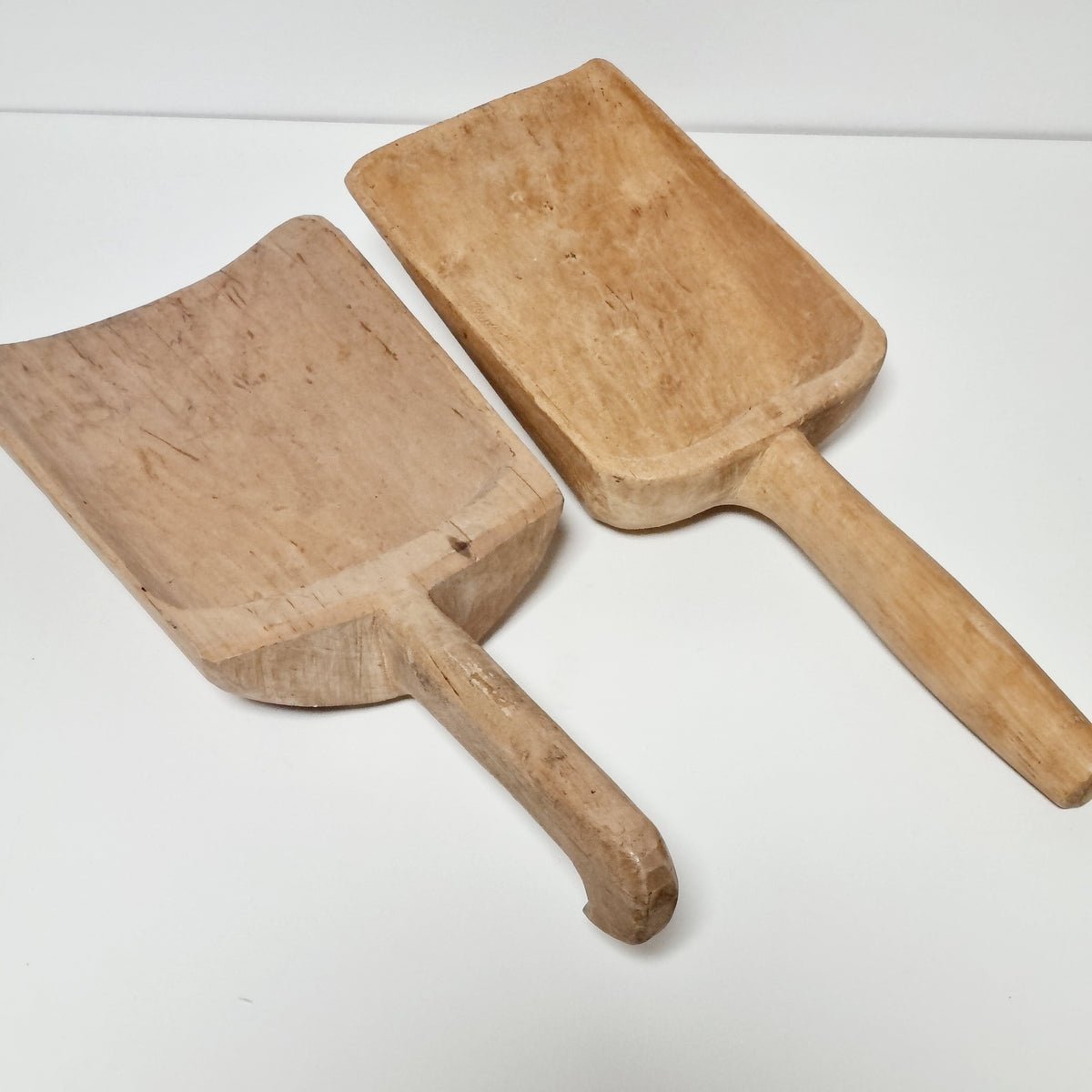 Pair of antique Swedish hand carved wooden grain and flour scoops
