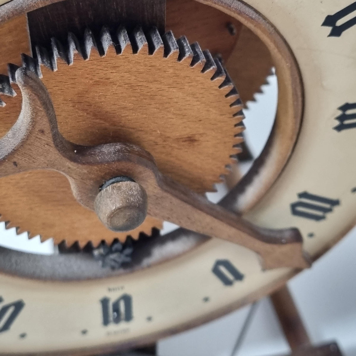 BUCO Swiss wooden gear table clock by Otto Baumann with exposed gears and foliot – photo 9