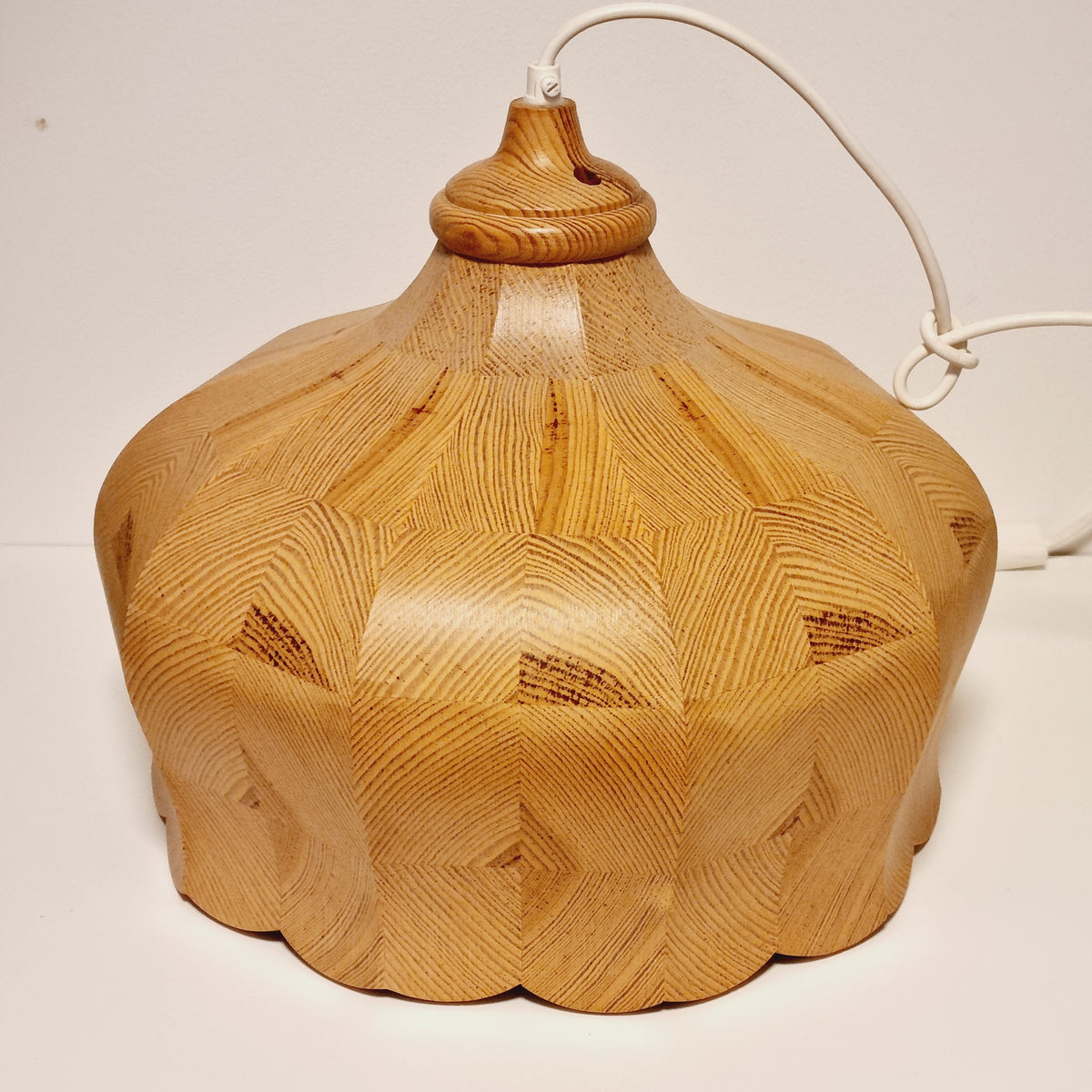 Vintage Swedish segmented pine pendant light from the 1970s, end grain wood mosaic with scalloped rim, front view