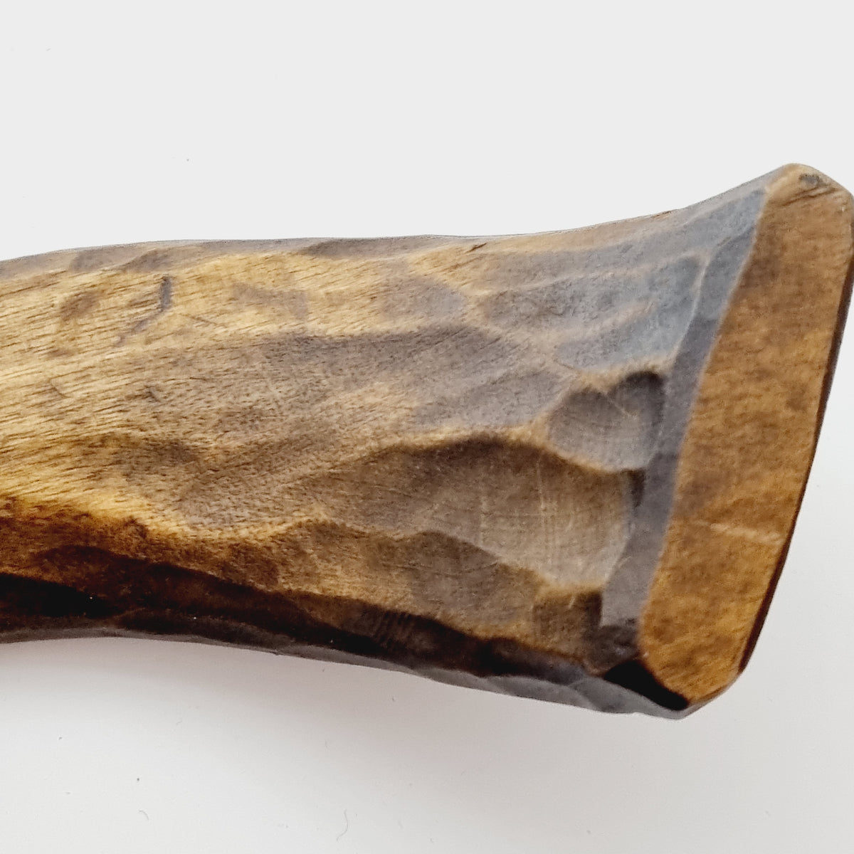 Carved texture on the rim of vintage Scandinavian wooden dish