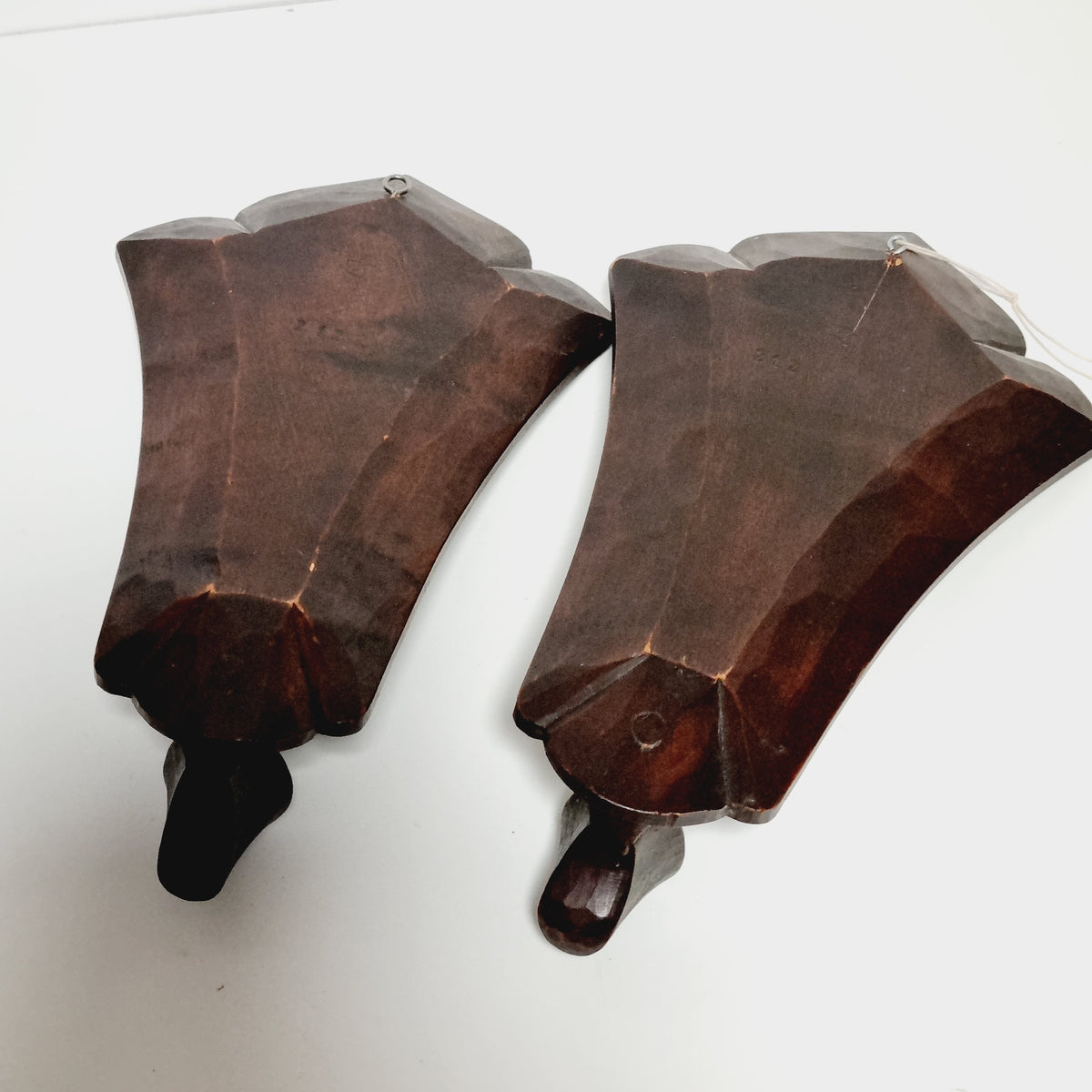 Pair of Swedish carved wood candle sconces, front view