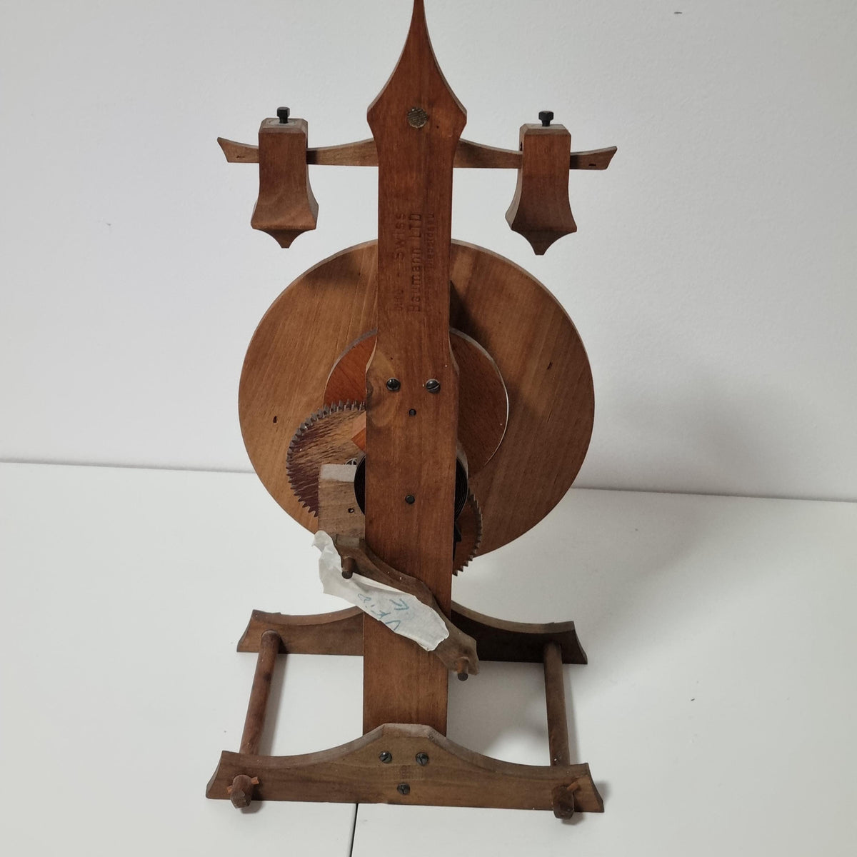 BUCO Swiss wooden gear table clock by Otto Baumann with exposed gears and foliot – photo 7