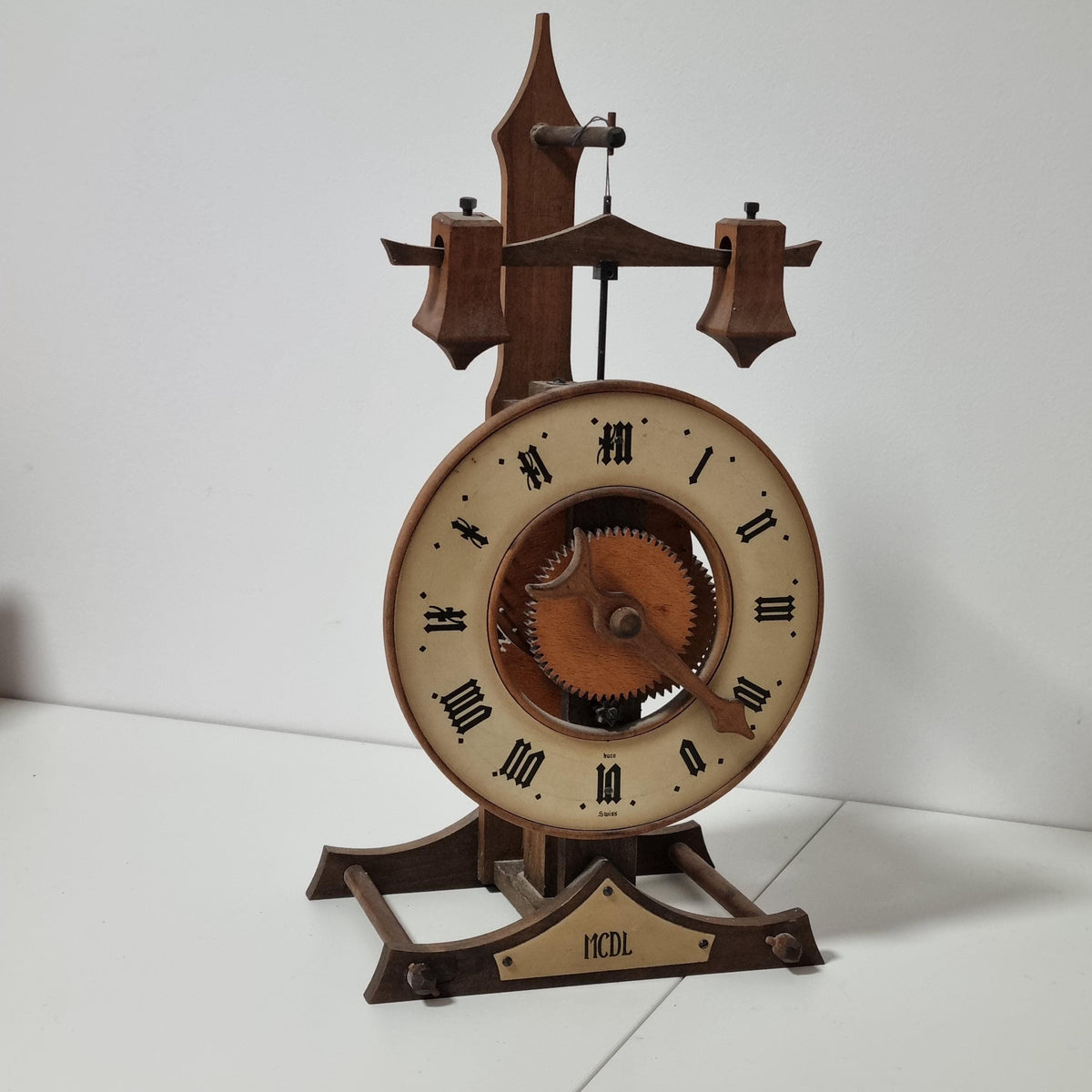BUCO Swiss wooden gear table clock by Otto Baumann with exposed gears and foliot – photo 4