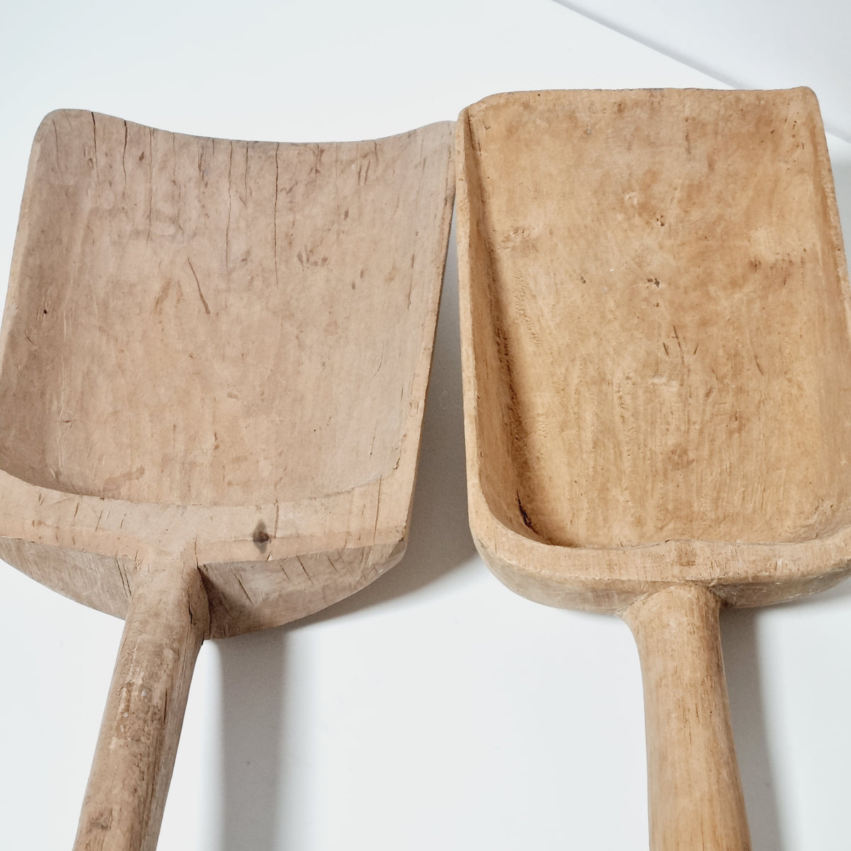 Pair of antique Swedish primitive wooden scoops from above