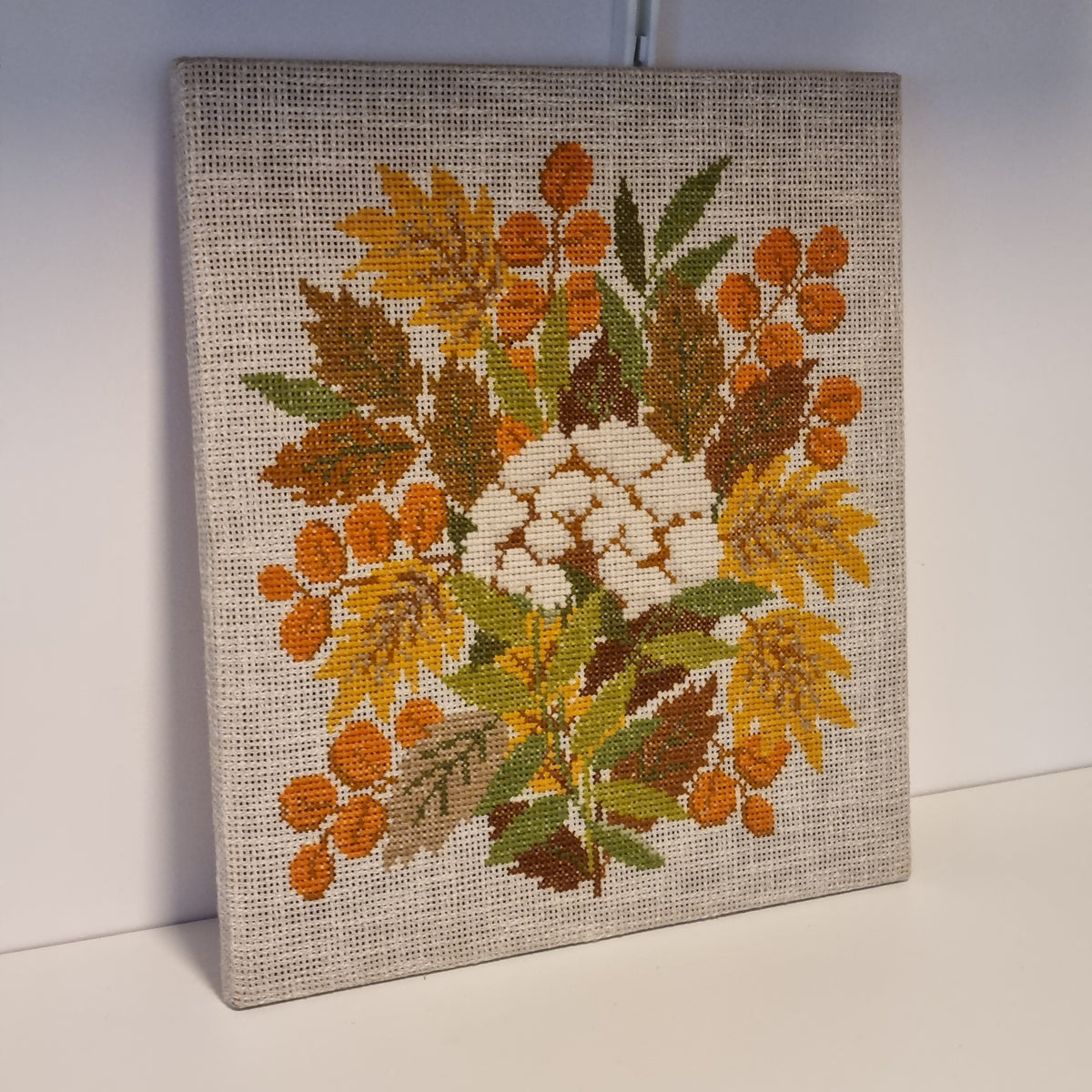 Swedish floral cross stitch wall art with golden flowers and orange berries – photo 5