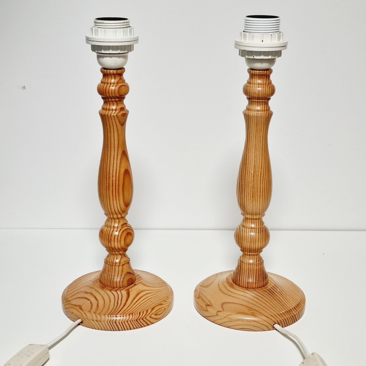 Pair of 1970s Swedish turned pine table lamps without shades