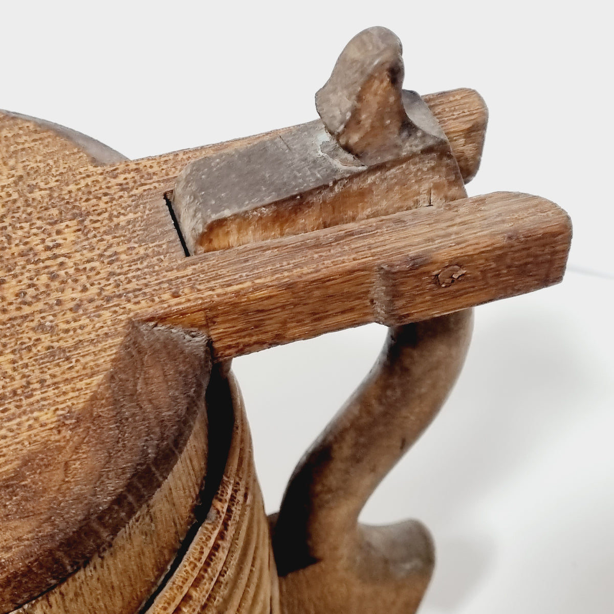 Wooden pin hinge and carved thumb piece on antique tankard lid