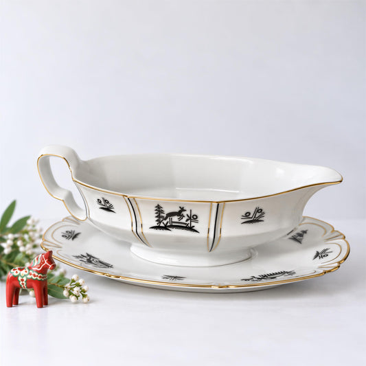 Gebrüder Benedikt Art Deco porcelain gravy boat and underplate with black deer