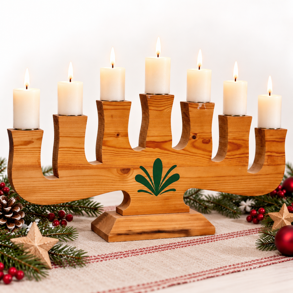Stig Jonsson Dala Industrier seven-arm pine candelabra with lit candles