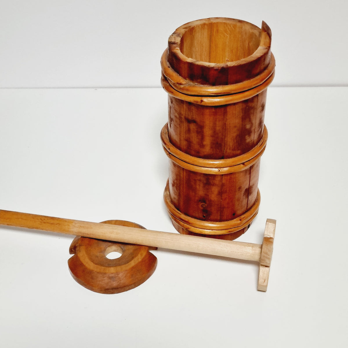 Miniature Swedish butter churn with lid and dasher, front view