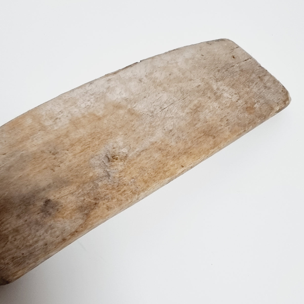Weathered silver-gray blade of the antique Swedish scutching knife