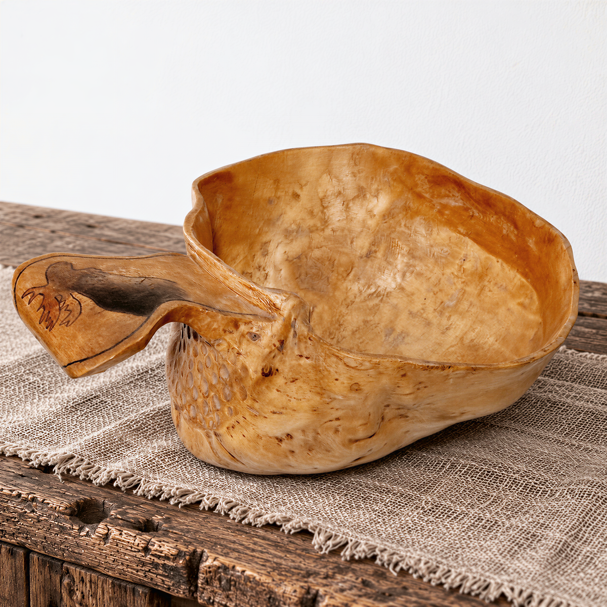 Swedish birch burl bowl with handle, side view