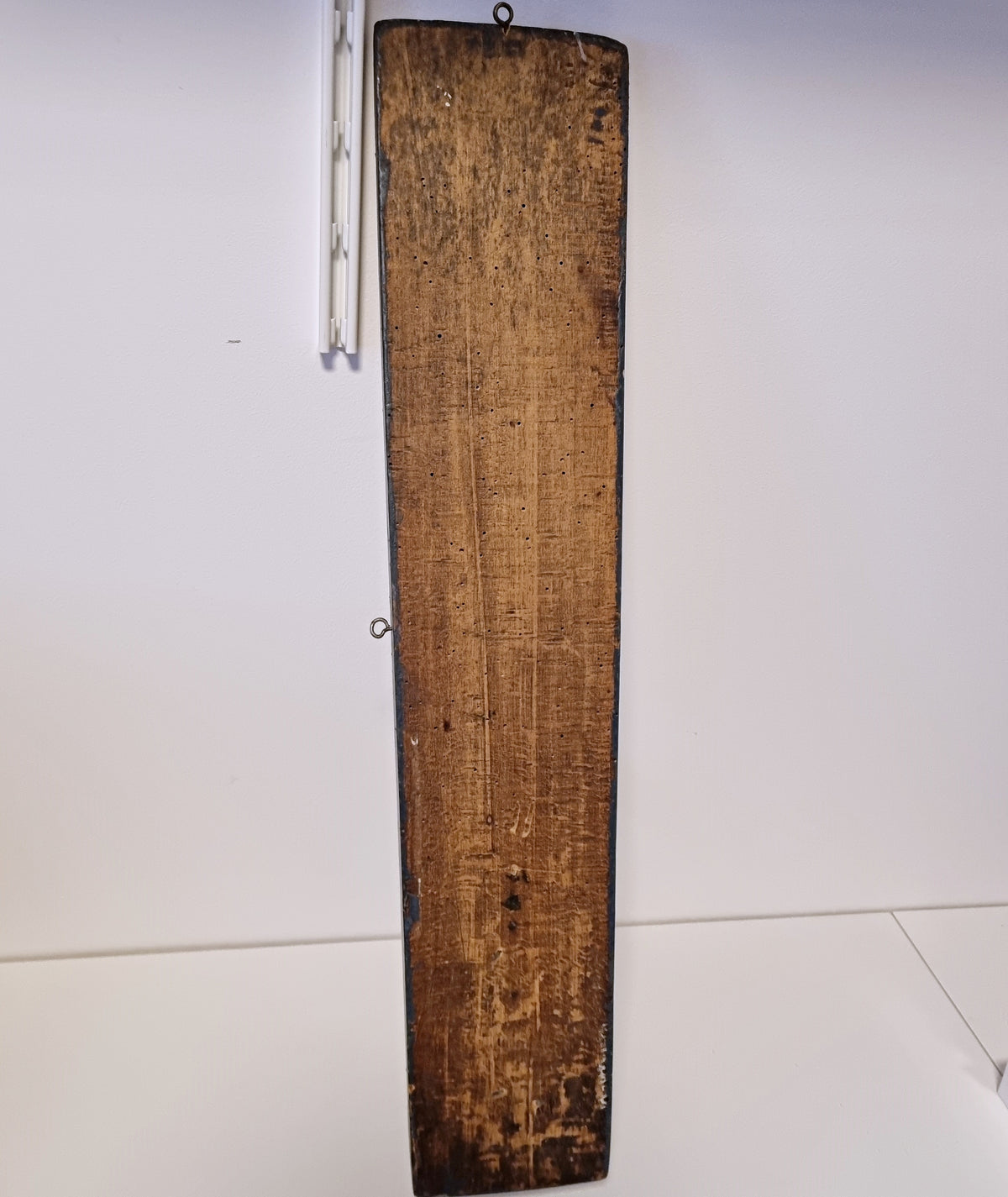 Full back view of antique Swedish wooden wall hook backboard
