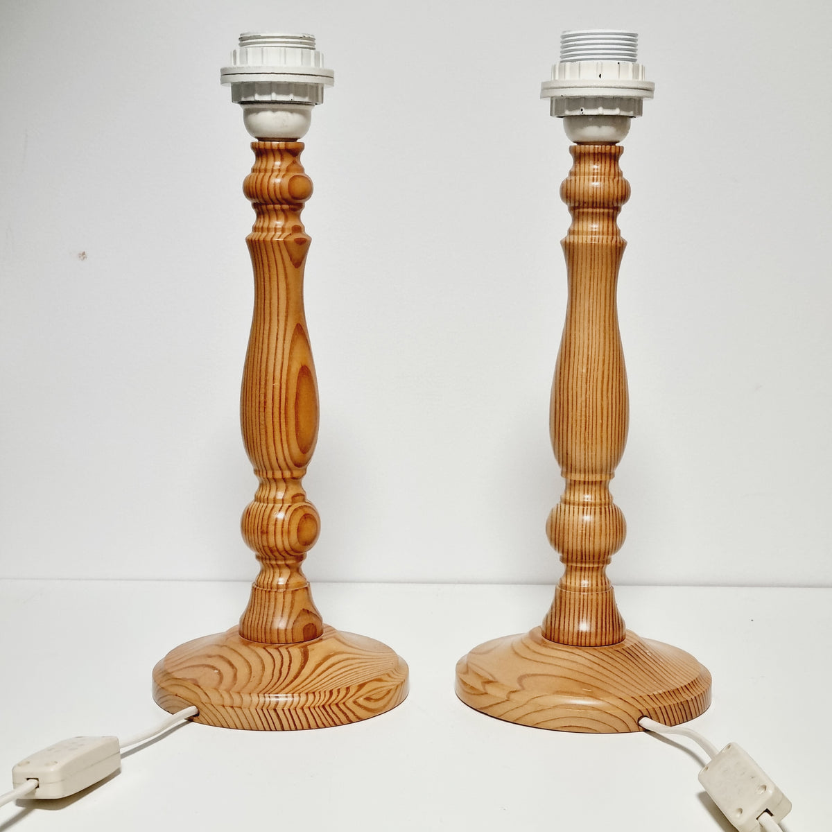 Matching pair of turned solid pine table lamps, Sweden 1970s