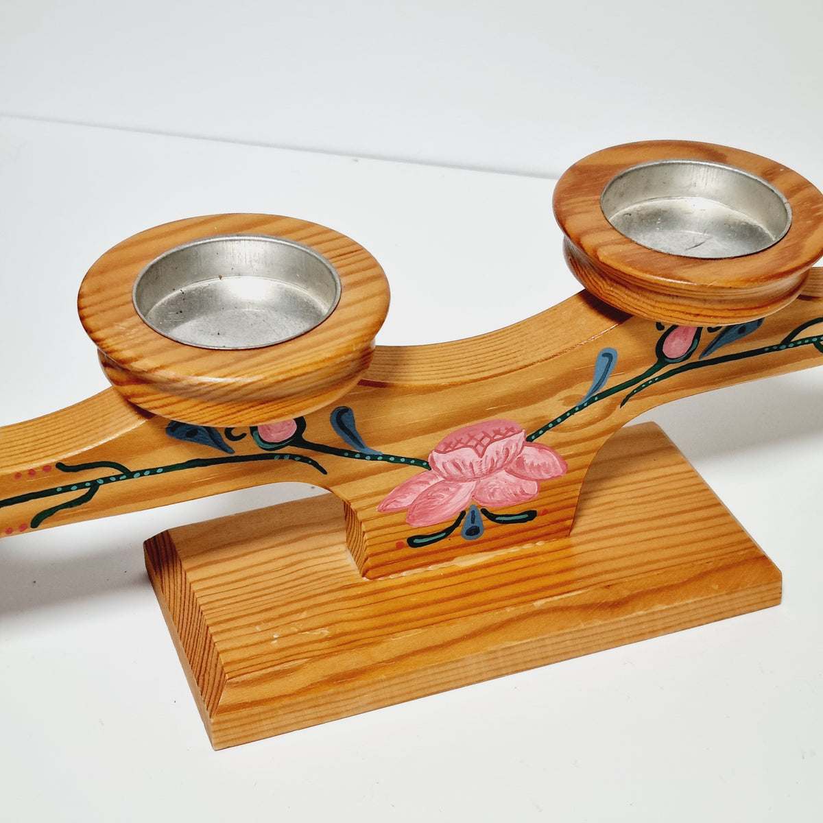 Painted rosebuds and blue leaves on vintage Swedish pine candelabra