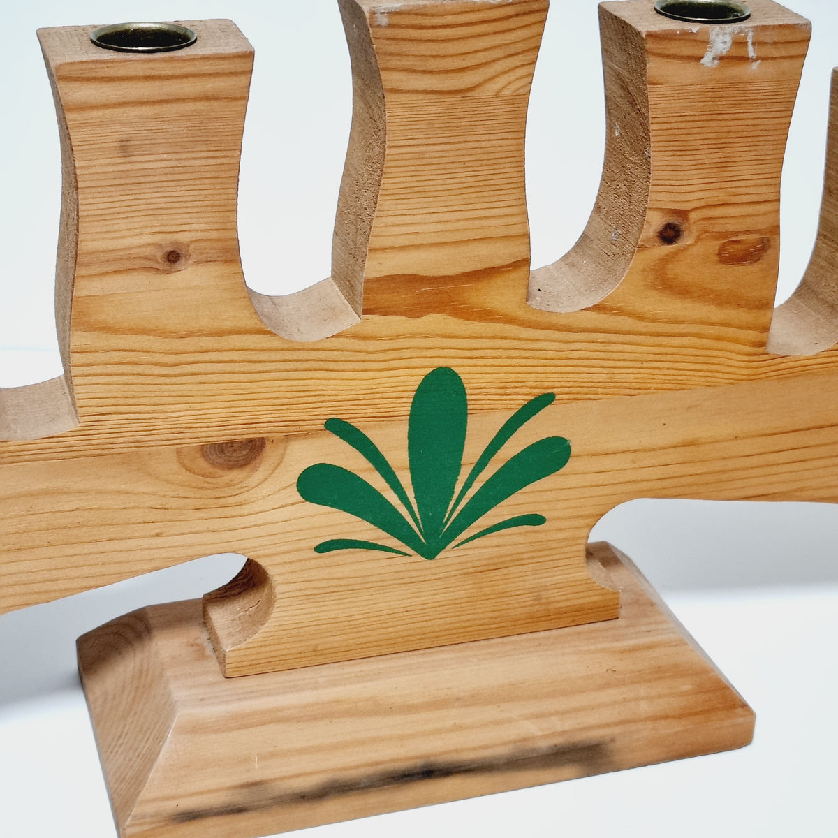 Green leaf motif on Dala Industrier pine candelabra