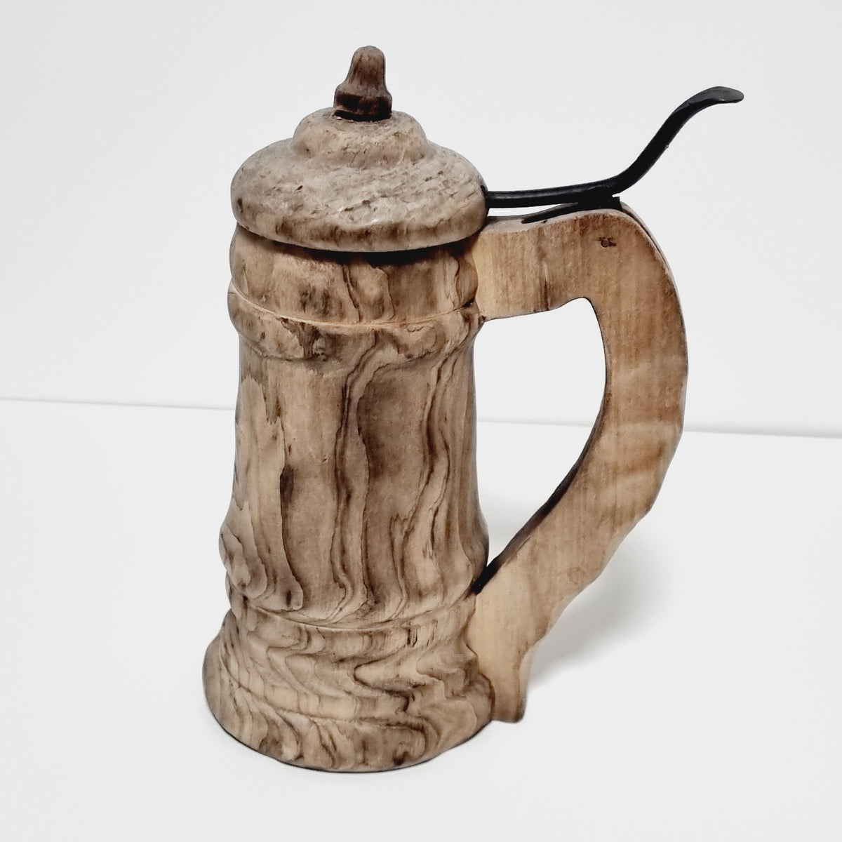 Hand carved Scandinavian wooden tankard, side view