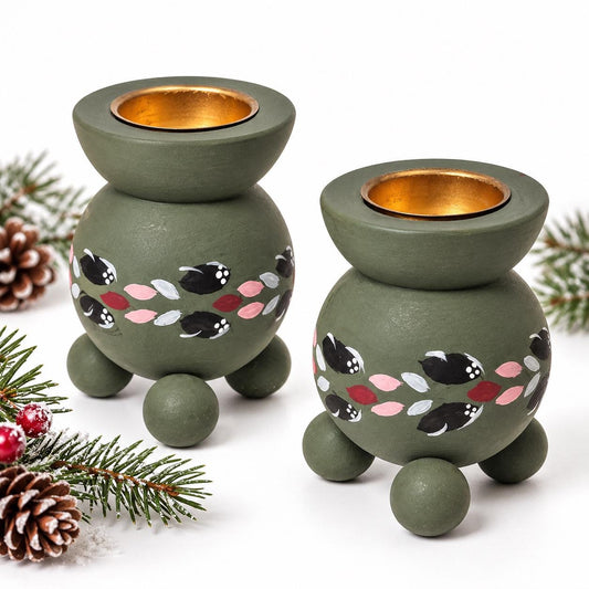 Pair of Swedish green hand-painted wooden candle holders with ball feet