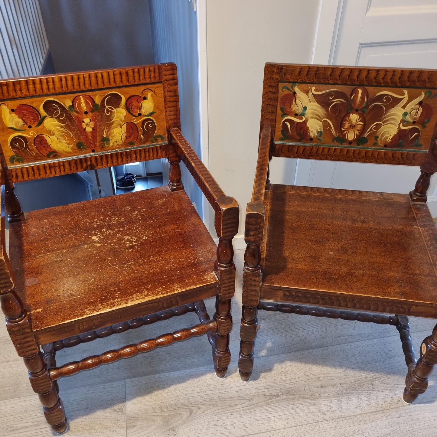 Pair of Antique Swedish Drop-Leaf Dining Set: Hand-Painted Kurbits Folk Art, Circa 1900 wooden armchairs with floral motifs
