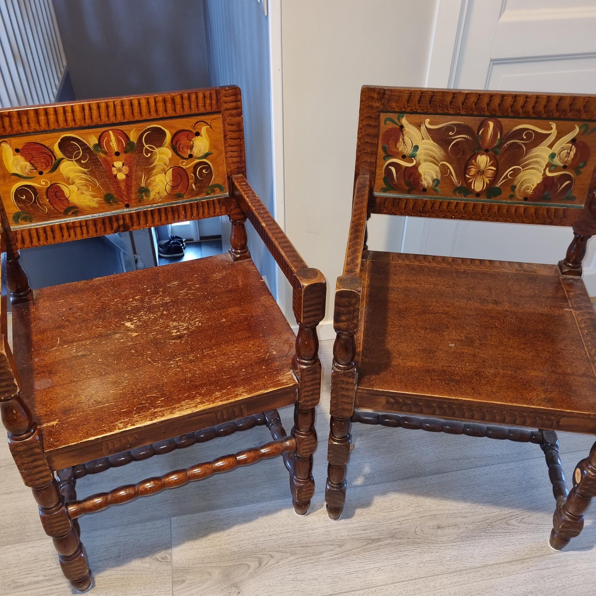 Pair of Antique Swedish Drop-Leaf Dining Set: Hand-Painted Kurbits Folk Art, Circa 1900 wooden armchairs with floral motifs