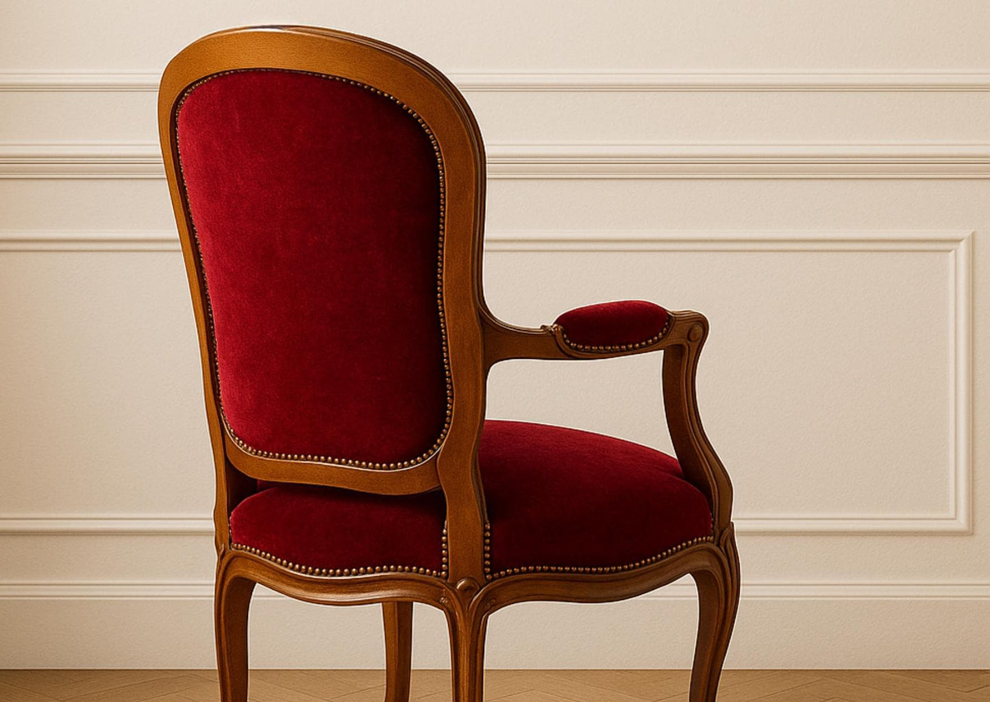 Vintage French Baroque Louis XV Armchairs – Rococo Revival Red Velvet Chairs with carved wooden frame against cream wall paneling