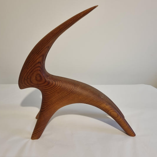 Vintage Carved Wood Goat Sculpture: Swedish MCM Organic Modern Decor with smooth grain and minimalist design.
