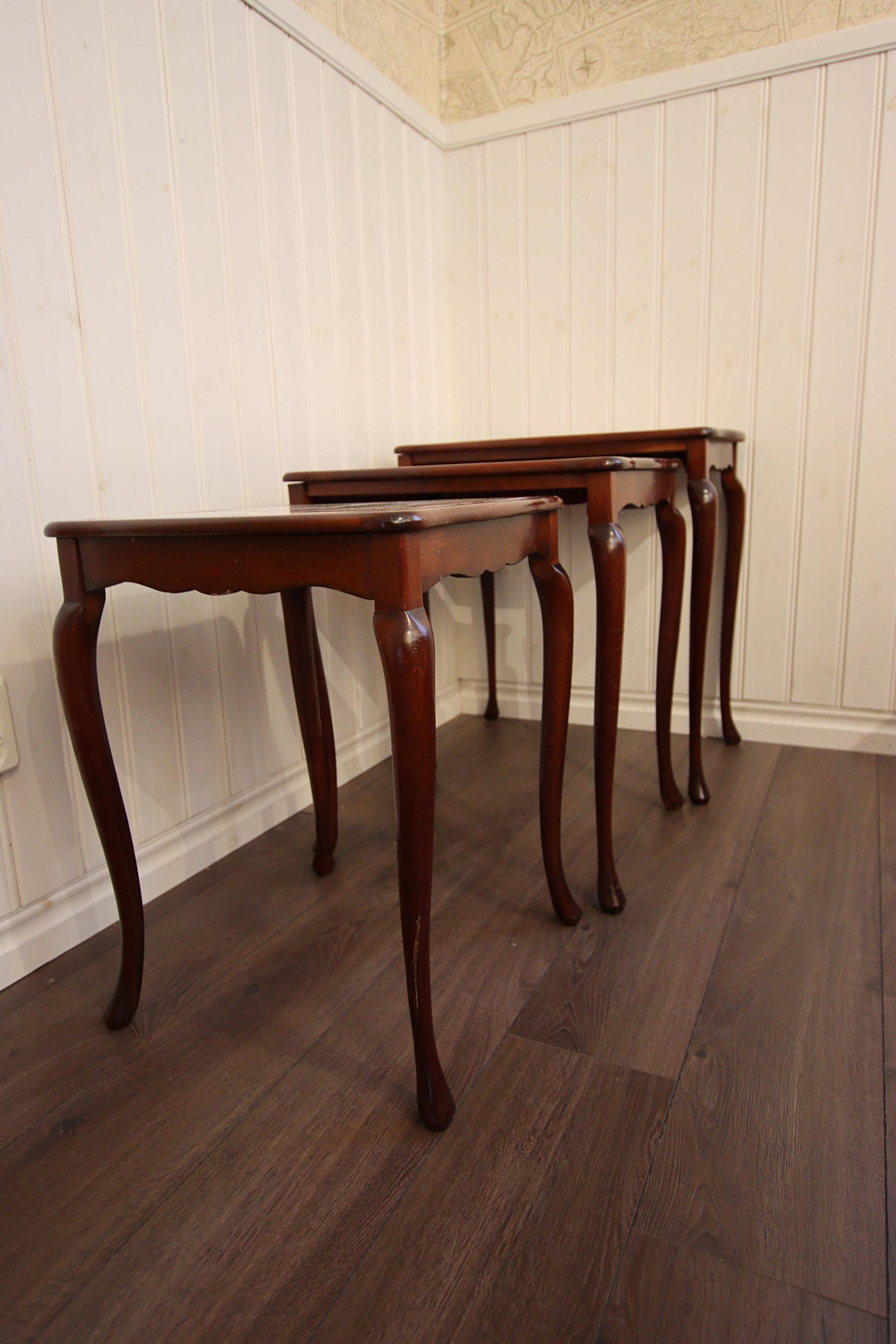 Rococo Nesting Tables: Hand-Painted Ceramic Tiles, 1960s Swedish Design with elegant curved wooden legs.