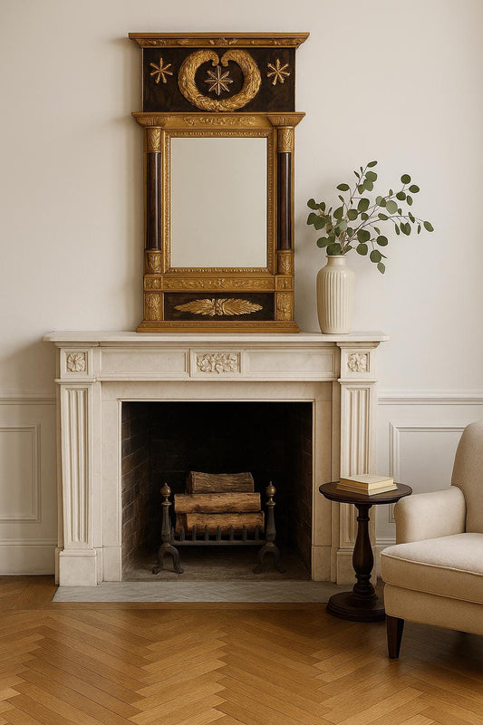 Regal Swedish Empire Mirror - Exquisite Neoclassical Accent - Vintage Gilded Wall Decor above a white marble fireplace with eucalyptus in vase nearby