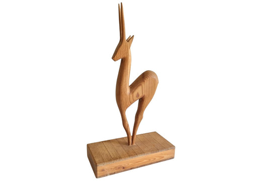 Hand Carved Wooden Antelope: Vintage Scandinavian Gazelle Figurine carved from wood with sleek mid-century modern design