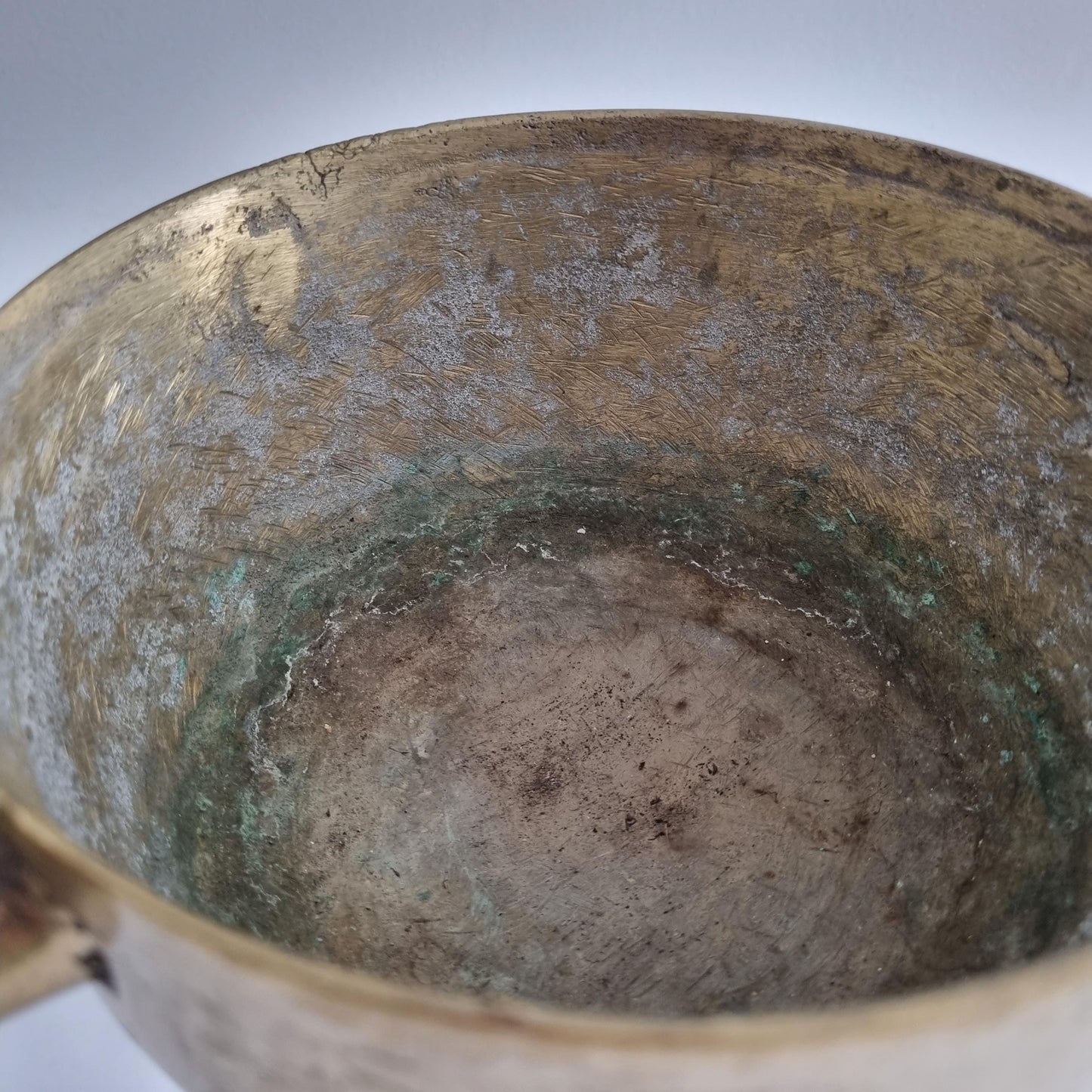 Antique Swedish Bronze Cauldron: Rustic Farmhouse Decor, Three-Legged Pot with aged patina and textured interior surface