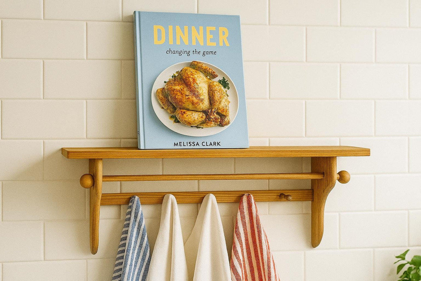 Rustic Pine Wall Shelf with Peg Hooks & Towel Bar - Farmhouse Kitchen Organizer holding a cookbook and hanging towels.