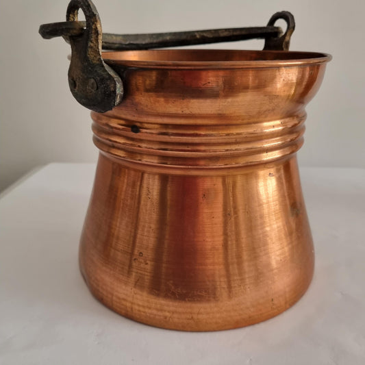 Antique Copper Bucket: Rustic Farmhouse Cauldron with Iron Handle showing hammered copper texture and sturdy iron handle