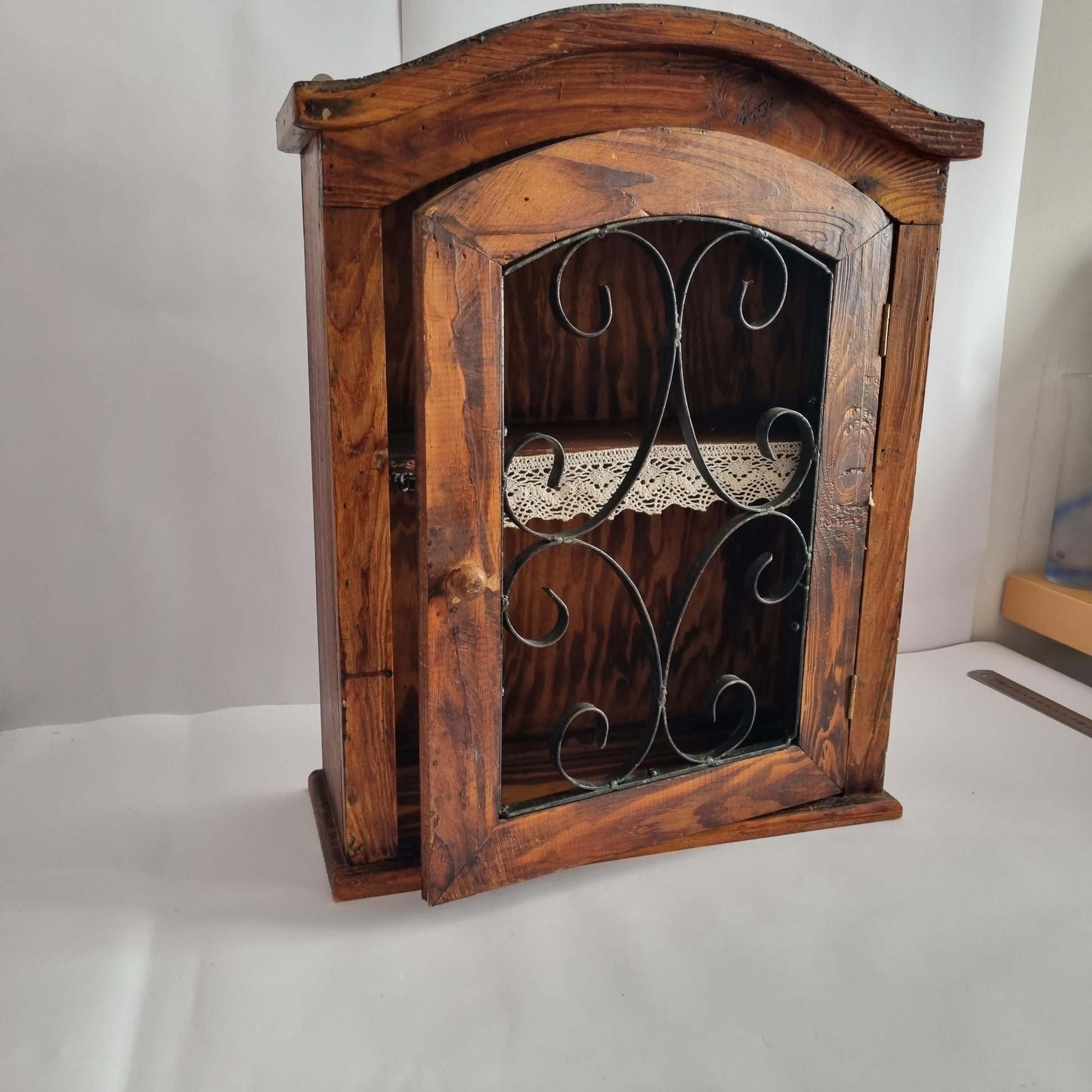 Antique Rustic Wood Wall Cabinet with Iron Door: Farmhouse Kitchen Storage featuring decorative wrought iron detailing