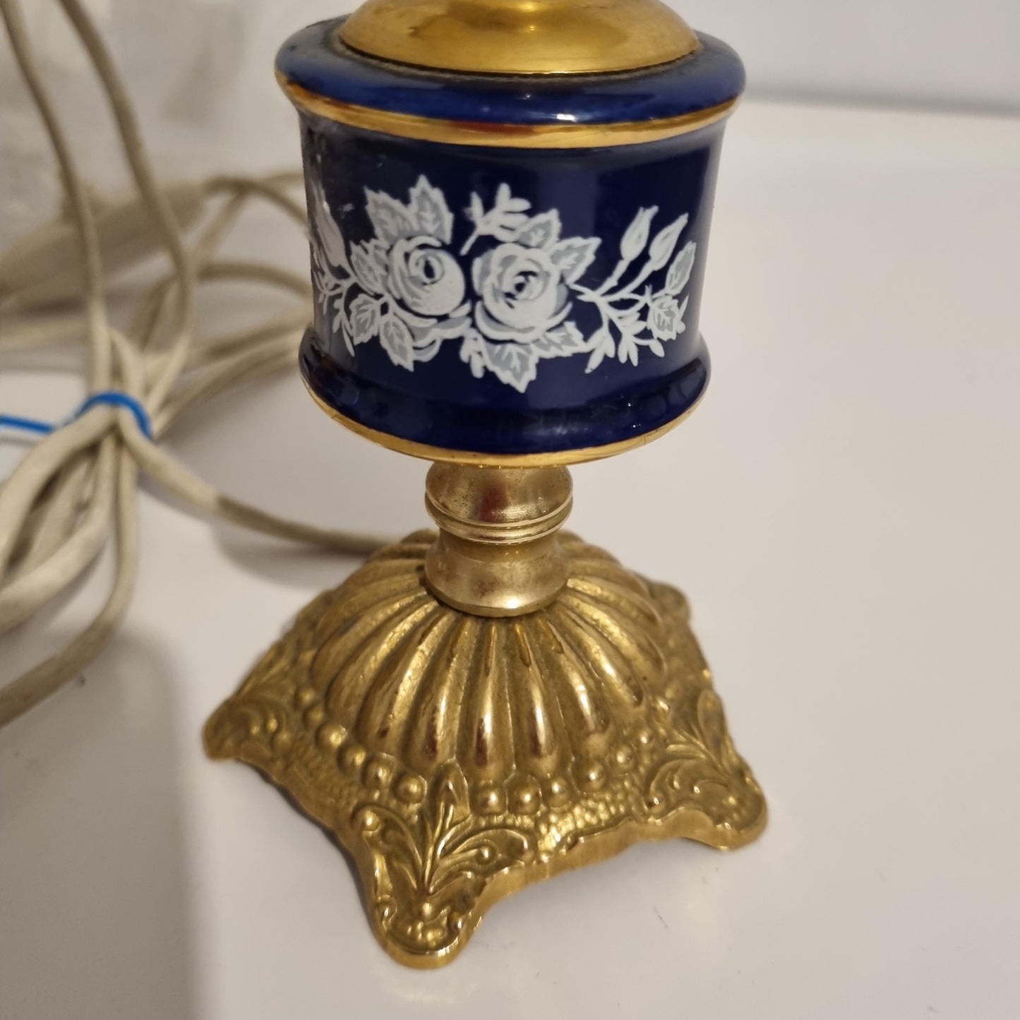 Vintage Swedish Rococo Table Lamp – Ceramic and Brass with Pleated Shade featuring ornate brass base and blue ceramic floral detail