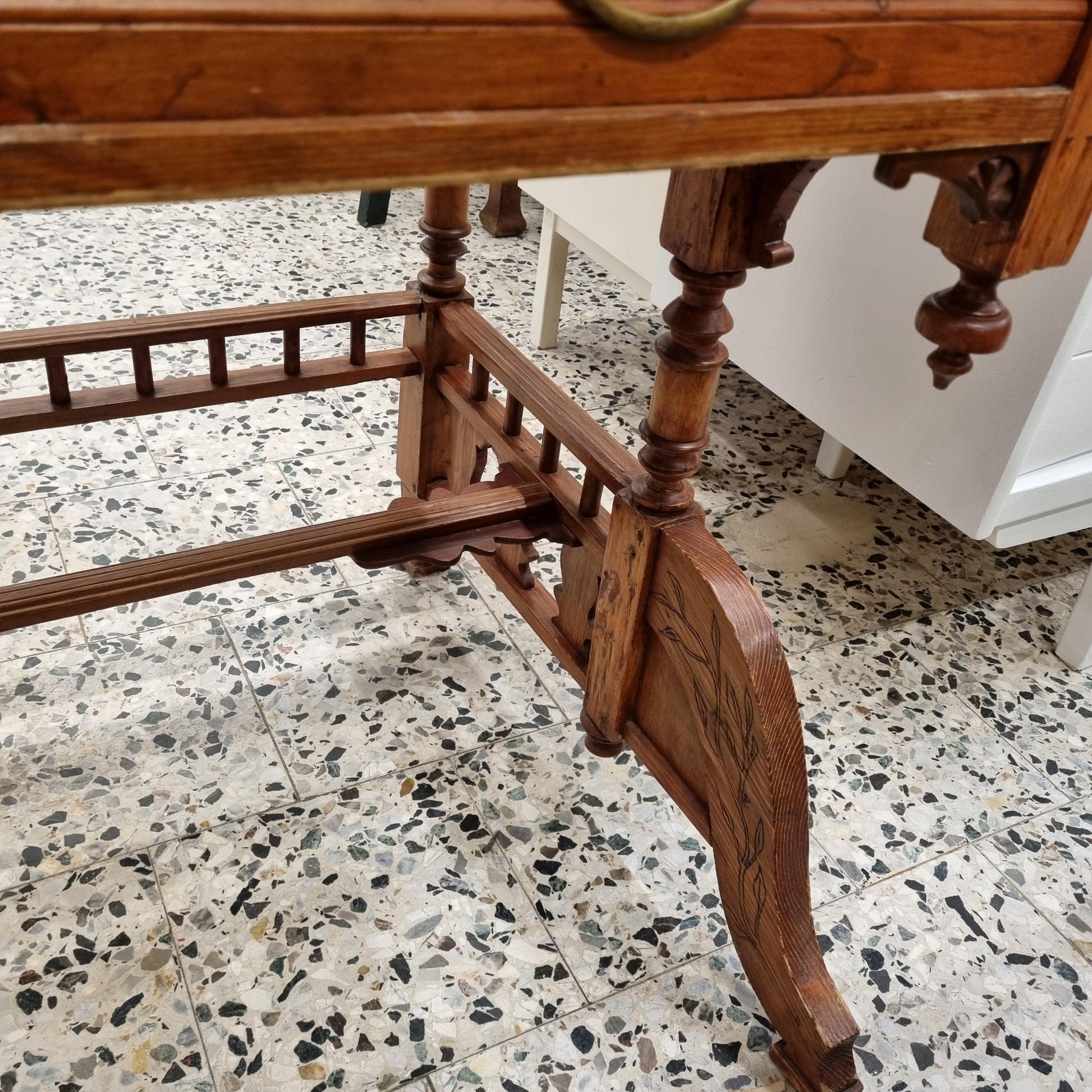 Antique Writing Desk – Original 19th Century Piece with Natural Patina showing detailed wooden leg and intricate craftsmanship